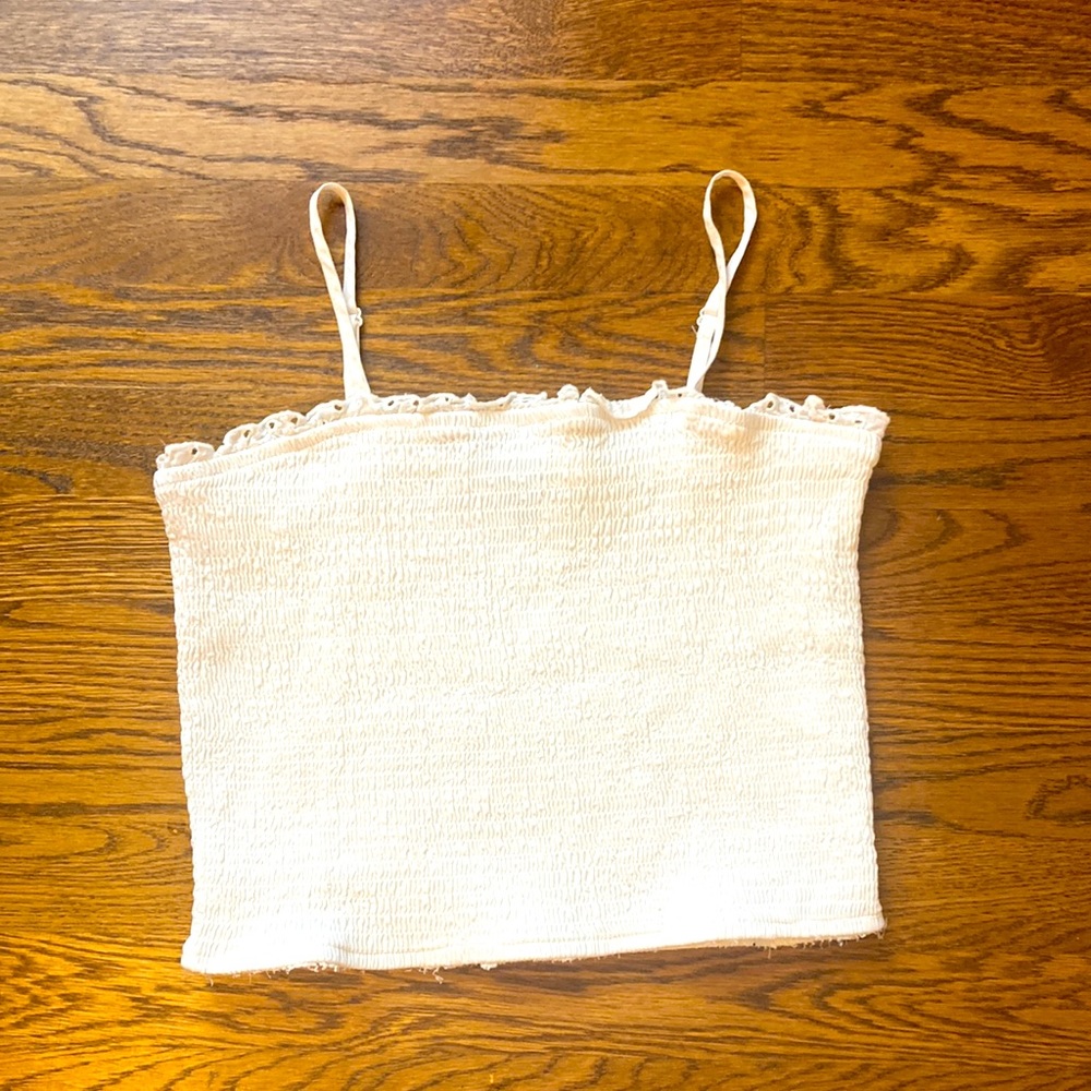 white tank top slightly cropped